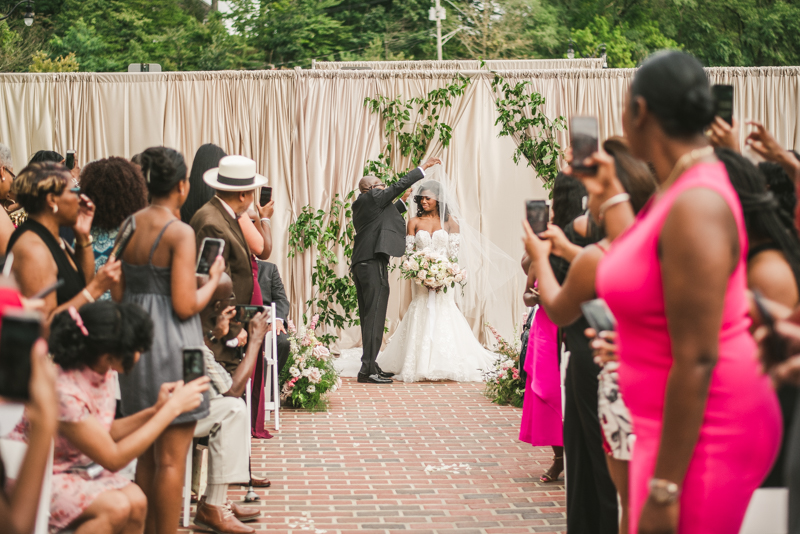 Beautiful wedding ceremony at Main Street Ballroom in Ellicott City by Britney Clause Photography
