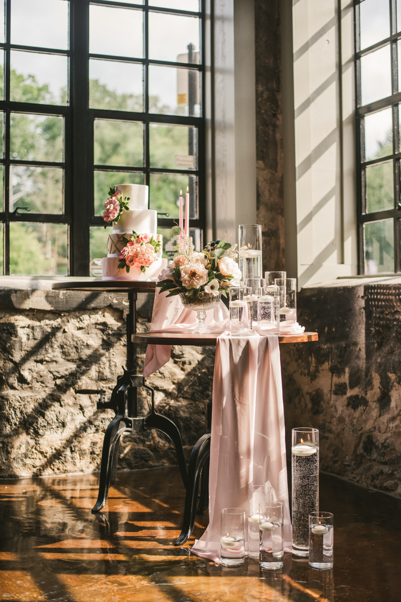 Beautiful wedding cake from Charm City Cakes at Main Street Ballroom in Ellicott City by Britney Clause Photography