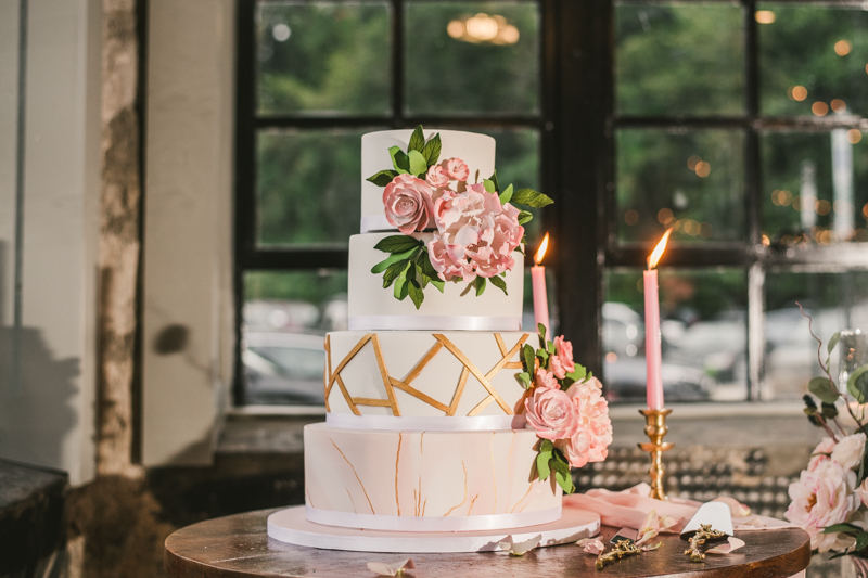 Beautiful wedding cake from Charm City Cakes at Main Street Ballroom in Ellicott City by Britney Clause Photography