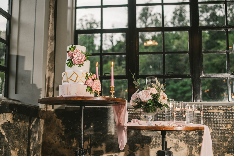 Beautiful wedding cake from Charm City Cakes at Main Street Ballroom in Ellicott City by Britney Clause Photography