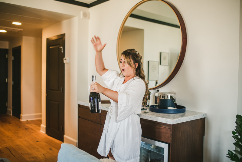 Getting ready for a Mount Vernon wedding at Hotel Revival in Baltimore, Maryland by Britney Clause Photography