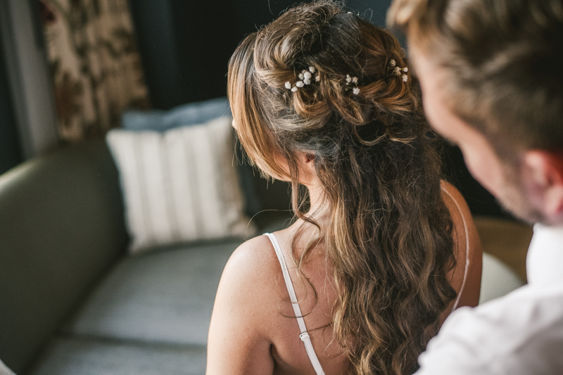 Getting ready for a Mount Vernon wedding at Hotel Revival in Baltimore, Maryland by Britney Clause Photography