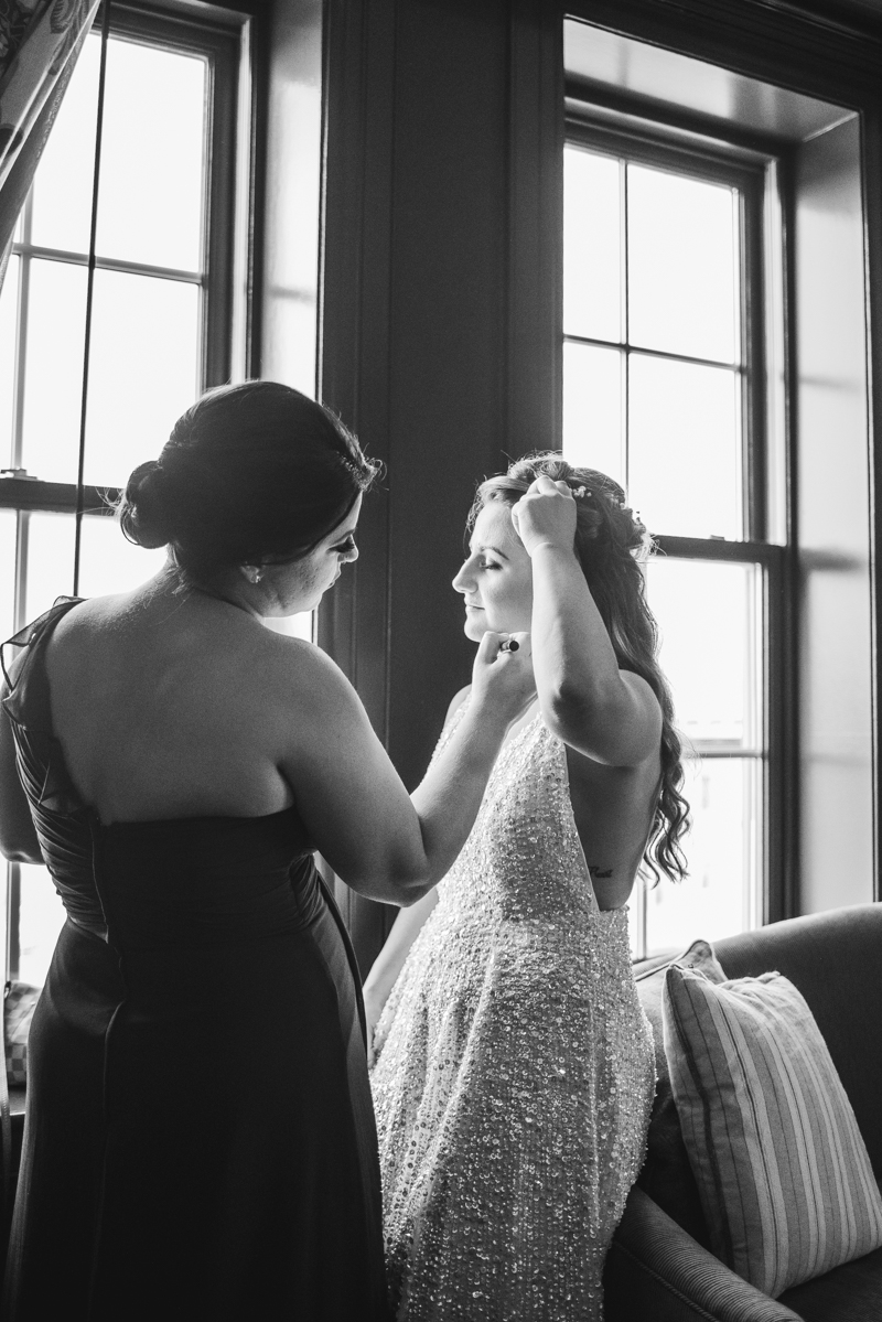 Getting ready for a Mount Vernon wedding at Hotel Revival in Baltimore, Maryland by Britney Clause Photography