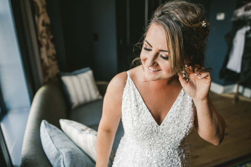 Getting ready for a Mount Vernon wedding at Hotel Revival in Baltimore, Maryland by Britney Clause Photography