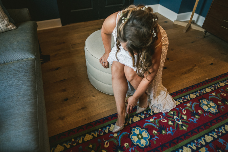 Bridal shoes from Jimmy Choo for a wedding reception at the George Peabody Library in Baltimore, Maryland by Britney Clause Photography