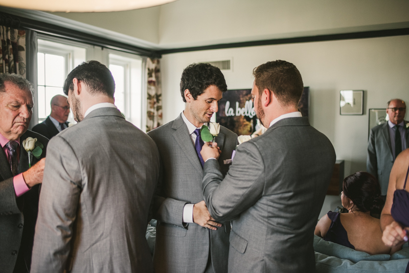 Getting ready for a Mount Vernon wedding at Hotel Revival in Baltimore, Maryland by Britney Clause Photography