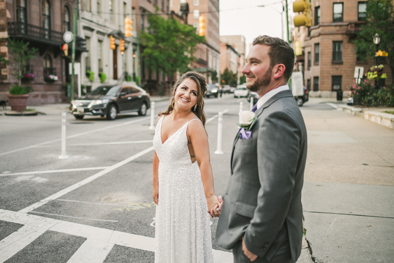 Beautiful bride and groom portraits in Mount Vernon, Maryland at the George Peabody Library by Britney Clause Photography