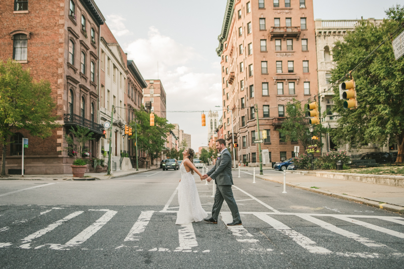 Beautiful bride and groom portraits in Mount Vernon, Maryland at the George Peabody Library by Britney Clause Photography