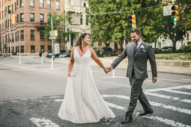 Beautiful bride and groom portraits in Mount Vernon, Maryland at the George Peabody Library by Britney Clause Photography