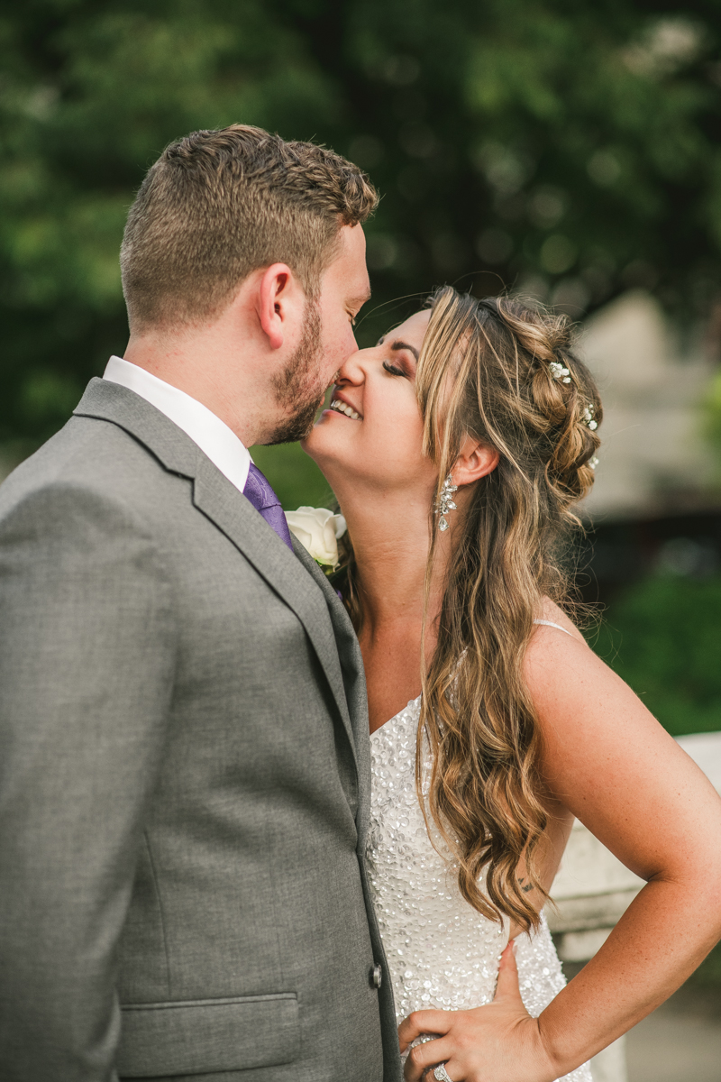 Beautiful bride and groom portraits in Mount Vernon, Maryland at the George Peabody Library by Britney Clause Photography