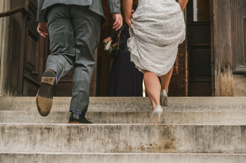 Beautiful bride and groom portraits in Mount Vernon, Maryland at the George Peabody Library by Britney Clause Photography