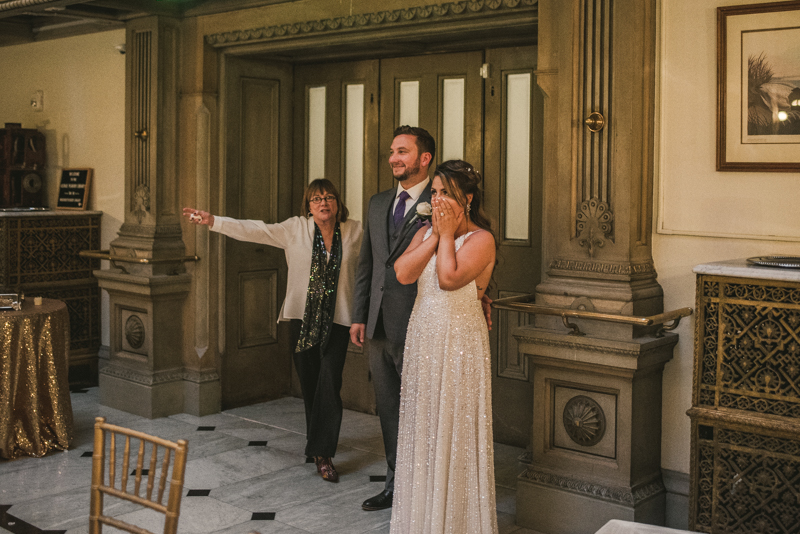 Beautiful bride and groom portraits in Mount Vernon, Maryland at the George Peabody Library by Britney Clause Photography