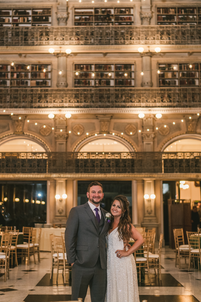 Beautiful bride and groom portraits in Mount Vernon, Maryland at the George Peabody Library by Britney Clause Photography