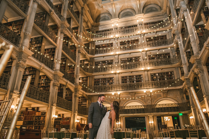 Beautiful bride and groom portraits in Mount Vernon, Maryland at the George Peabody Library by Britney Clause Photography