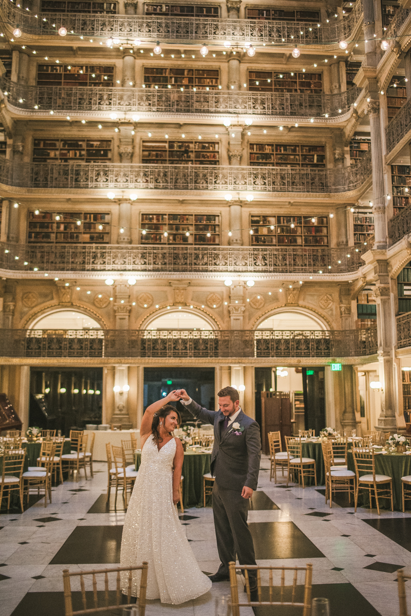 Beautiful bride and groom portraits in Mount Vernon, Maryland at the George Peabody Library by Britney Clause Photography