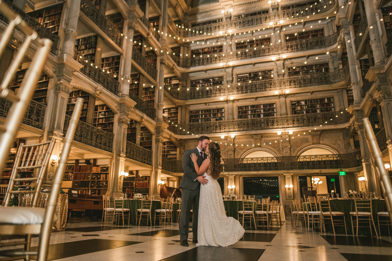 Beautiful bride and groom portraits in Mount Vernon, Maryland at the George Peabody Library by Britney Clause Photography