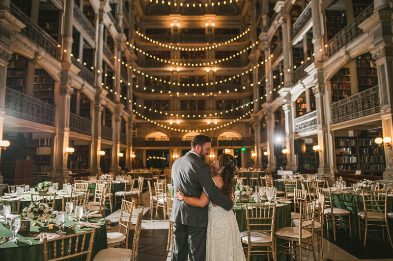 Beautiful bride and groom portraits in Mount Vernon, Maryland at the George Peabody Library by Britney Clause Photography