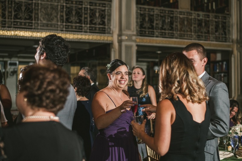 A gorgeous wedding reception at the George Peabody Library in Baltimore, Maryland by Britney Clause Photography