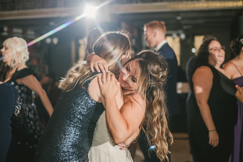 A gorgeous wedding reception at the George Peabody Library in Baltimore, Maryland by Britney Clause Photography