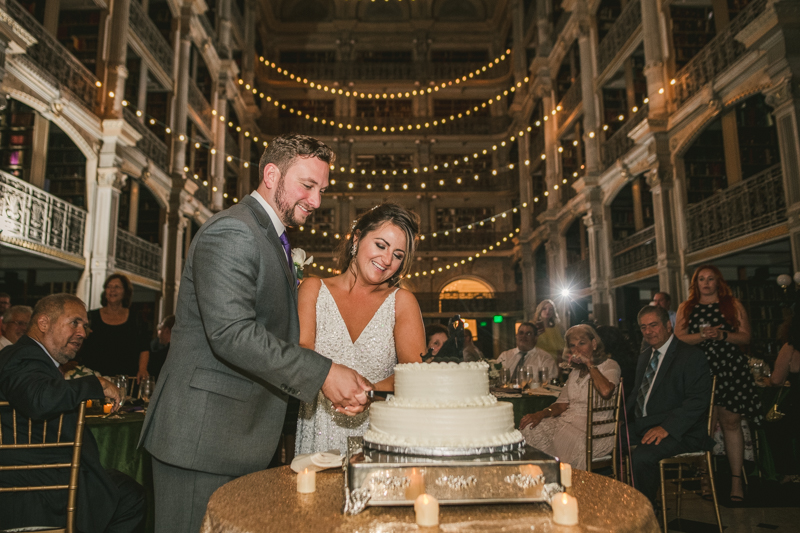 A delicious wedding cake by Classic Catering at George Peabody Library in Mount Vernon, Maryland by Britney Clause Photography