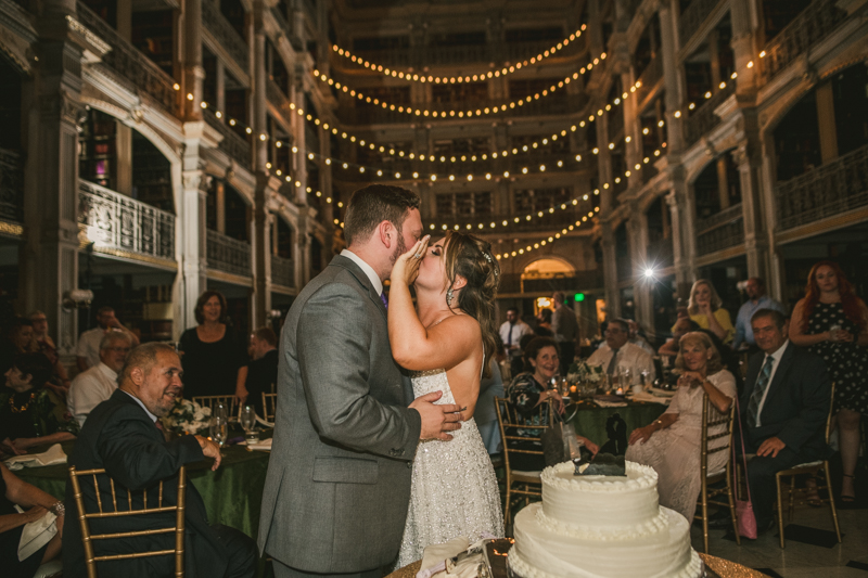 A delicious wedding cake by Classic Catering at George Peabody Library in Mount Vernon, Maryland by Britney Clause Photography