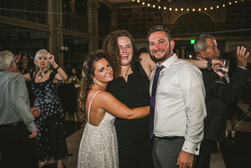 A gorgeous and fun wedding reception at the George Peabody Library in Baltimore, Maryland by Britney Clause Photography