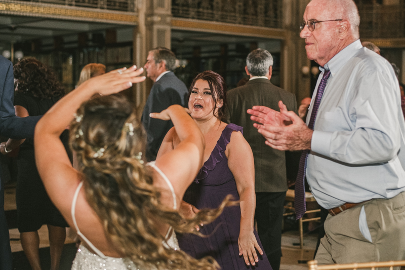 A gorgeous and fun wedding reception at the George Peabody Library in Baltimore, Maryland by Britney Clause Photography