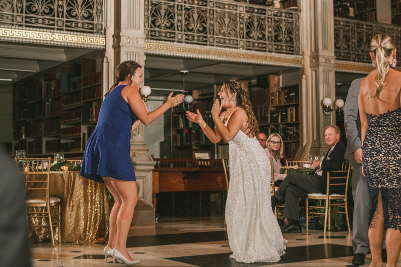 A gorgeous and fun wedding reception at the George Peabody Library in Baltimore, Maryland by Britney Clause Photography