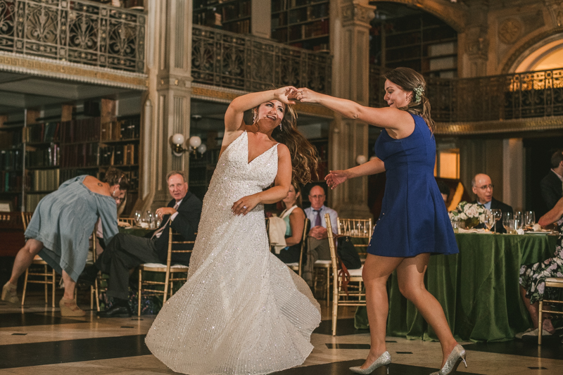 A gorgeous and fun wedding reception at the George Peabody Library in Baltimore, Maryland by Britney Clause Photography