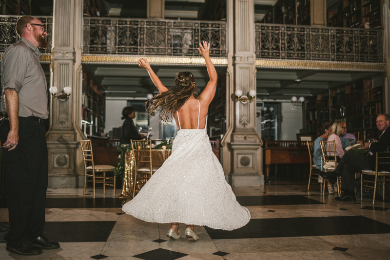A gorgeous and fun wedding reception at the George Peabody Library in Baltimore, Maryland by Britney Clause Photography