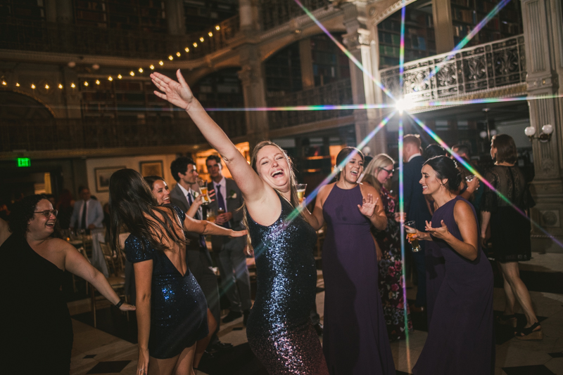 A gorgeous and fun wedding reception at the George Peabody Library in Baltimore, Maryland by Britney Clause Photography