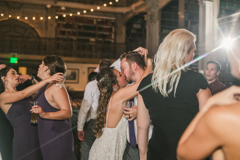 A gorgeous and fun wedding reception at the George Peabody Library in Baltimore, Maryland by Britney Clause Photography