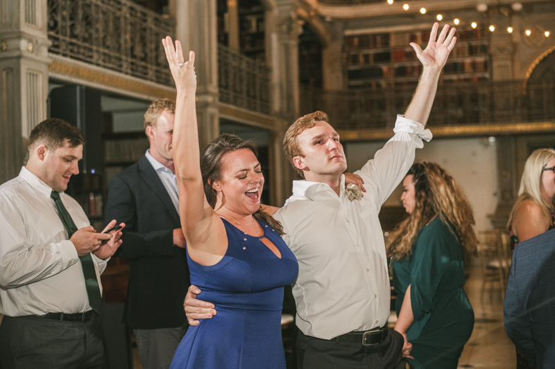 A gorgeous and fun wedding reception at the George Peabody Library in Baltimore, Maryland by Britney Clause Photography