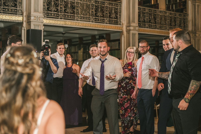 A gorgeous and fun wedding reception at the George Peabody Library in Baltimore, Maryland by Britney Clause Photography