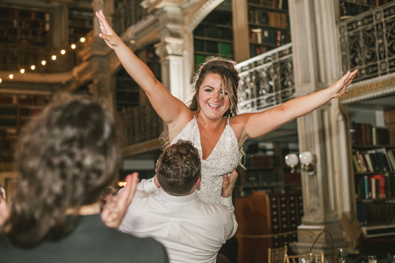 A gorgeous and fun wedding reception at the George Peabody Library in Baltimore, Maryland by Britney Clause Photography