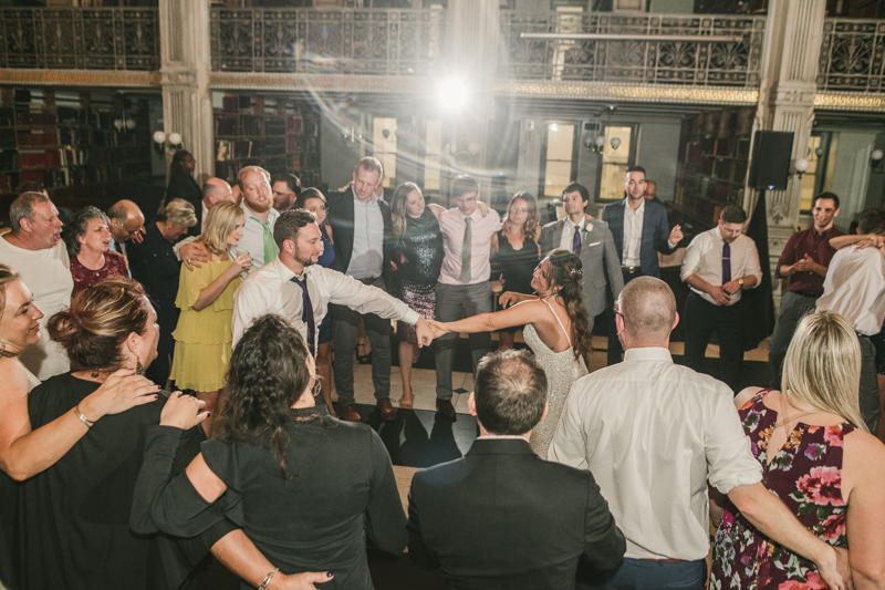 A gorgeous and fun wedding reception at the George Peabody Library in Baltimore, Maryland by Britney Clause Photography