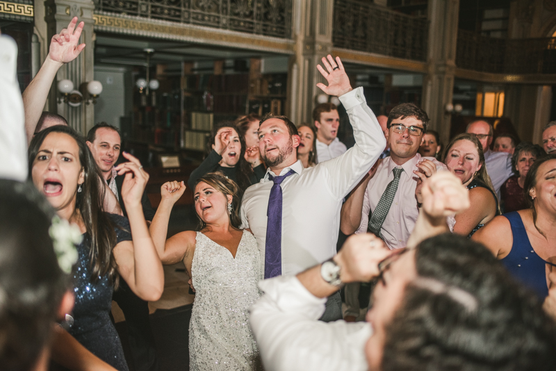 A gorgeous and fun wedding reception at the George Peabody Library in Baltimore, Maryland by Britney Clause Photography