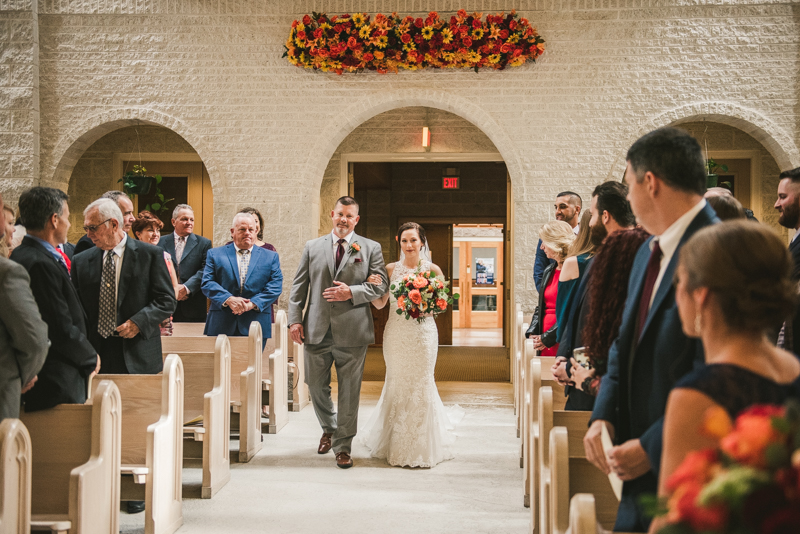 Gorgeous wedding ceremony at Jesus the Good Shepherd Church in Owings in Maryland. Photo by Britney Clause Photography