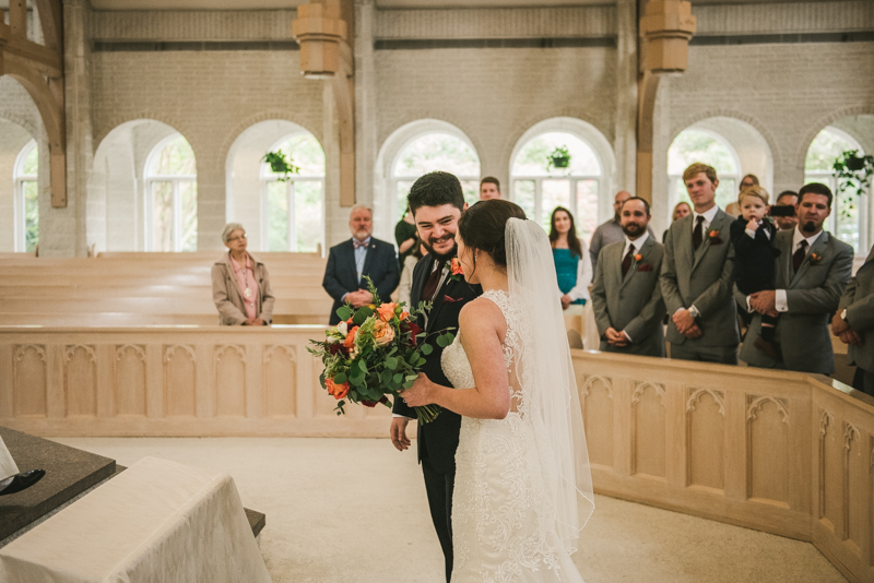 Gorgeous wedding ceremony at Jesus the Good Shepherd Church in Owings in Maryland. Photo by Britney Clause Photography