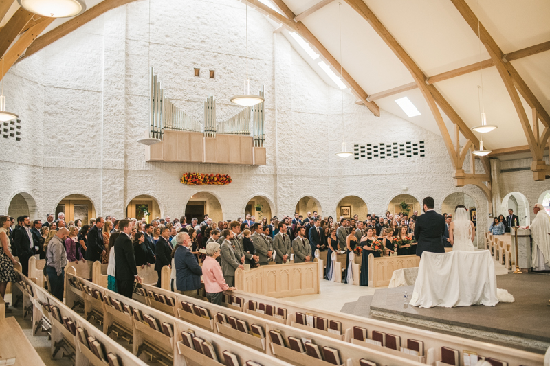 Gorgeous wedding ceremony at Jesus the Good Shepherd Church in Owings in Maryland. Photo by Britney Clause Photography