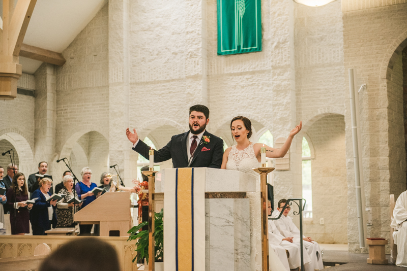 Gorgeous wedding ceremony at Jesus the Good Shepherd Church in Owings in Maryland. Photo by Britney Clause Photography