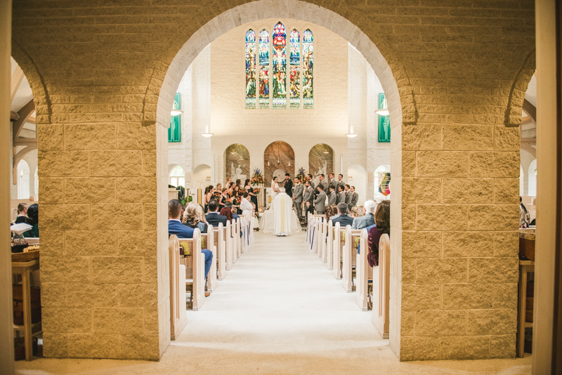 Gorgeous wedding ceremony at Jesus the Good Shepherd Church in Owings in Maryland. Photo by Britney Clause Photography