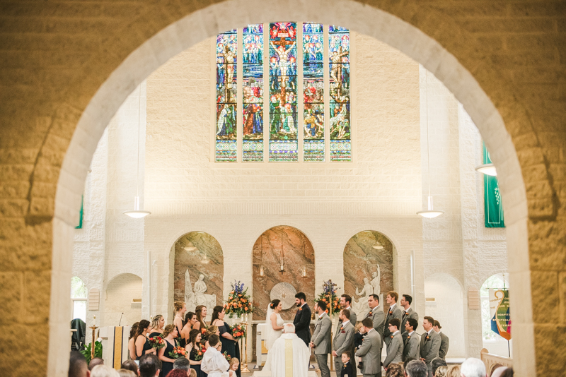 Gorgeous wedding ceremony at Jesus the Good Shepherd Church in Owings in Maryland. Photo by Britney Clause Photography