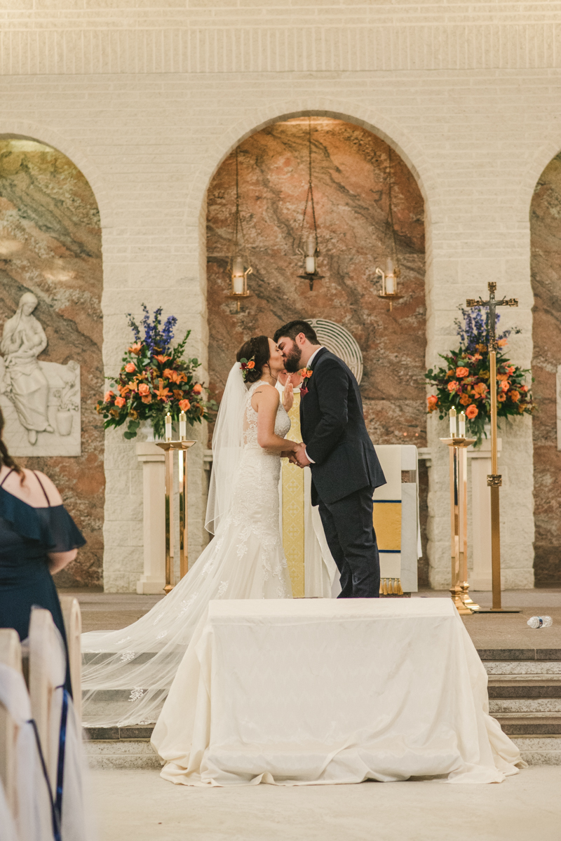 Gorgeous wedding ceremony at Jesus the Good Shepherd Church in Owings in Maryland. Photo by Britney Clause Photography