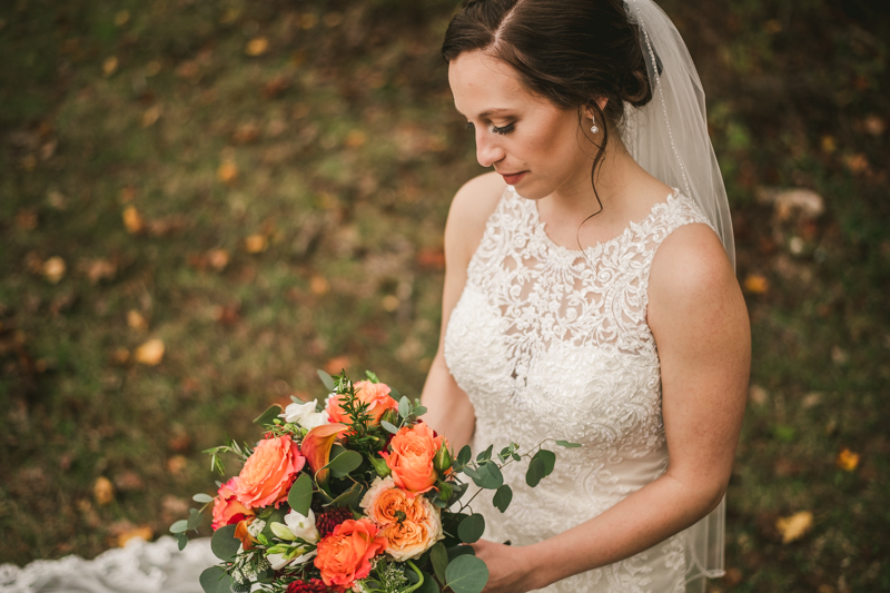 Stunning fall bride and groom just married portraits at The Barn at Pleasant Acres in Maryland. Photo by Britney Clause Photography