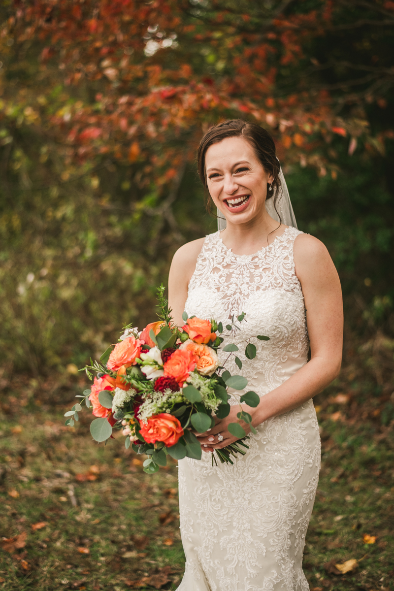 Stunning fall bride and groom just married portraits at The Barn at Pleasant Acres in Maryland. Photo by Britney Clause Photography