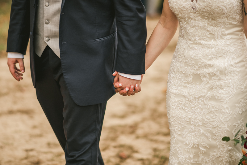 Stunning fall bride and groom just married portraits at The Barn at Pleasant Acres in Maryland. Photo by Britney Clause Photography