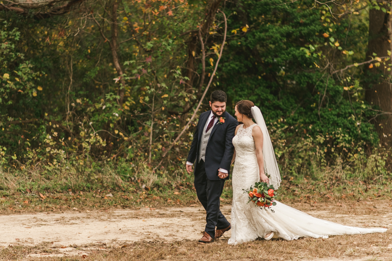 Stunning fall bride and groom just married portraits at The Barn at Pleasant Acres in Maryland. Photo by Britney Clause Photography