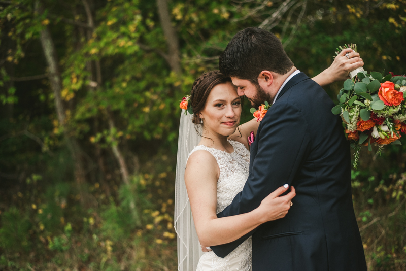 Stunning fall bride and groom just married portraits at The Barn at Pleasant Acres in Maryland. Photo by Britney Clause Photography