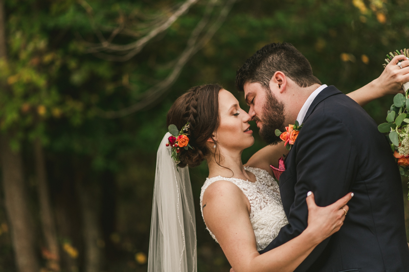 Stunning fall bride and groom just married portraits at The Barn at Pleasant Acres in Maryland. Photo by Britney Clause Photography